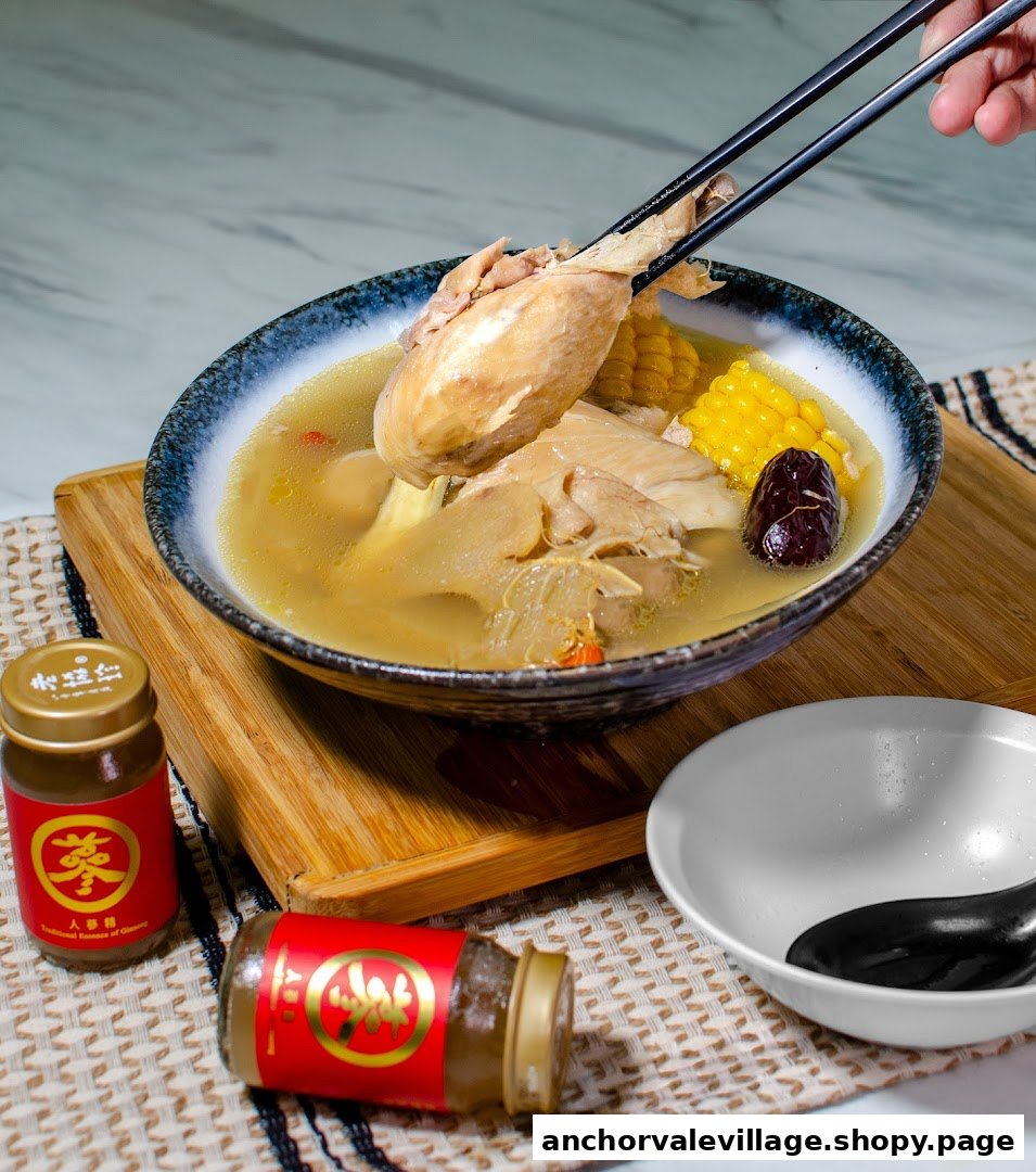 A delicious bowl of chicken soup with corn and herbs, served with ginseng essence.