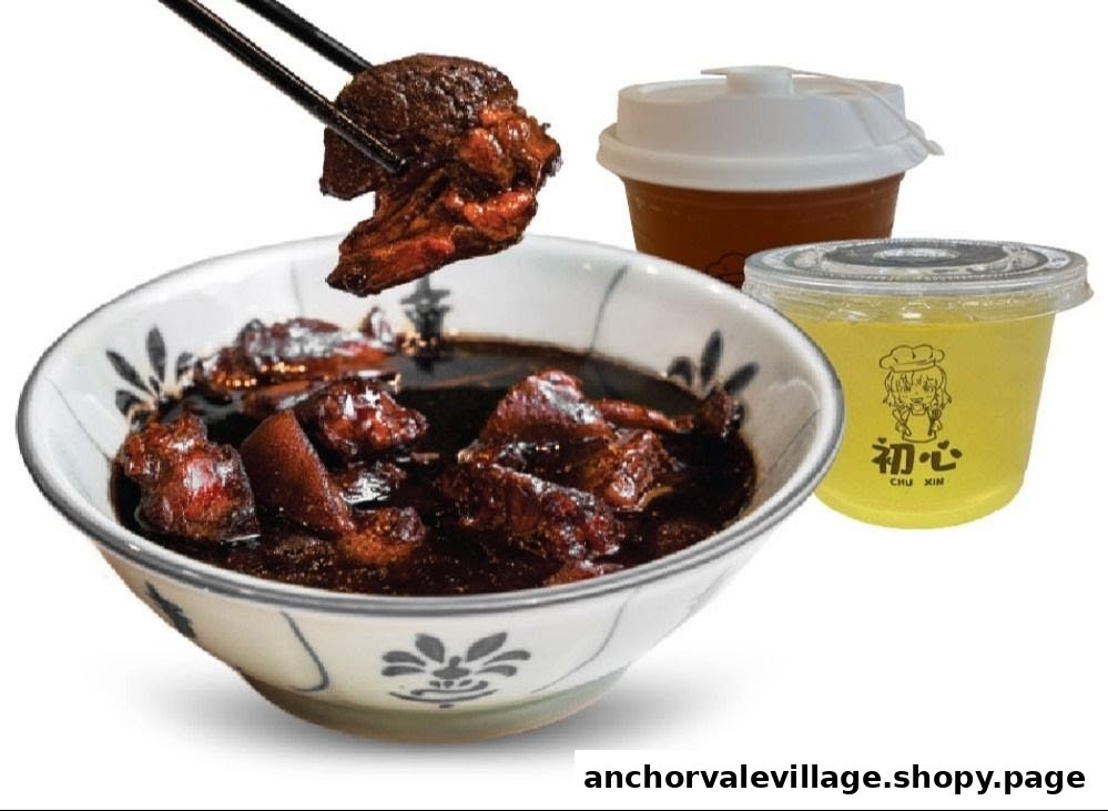 A bowl of dark stewed meat with chopsticks, accompanied by two beverages.