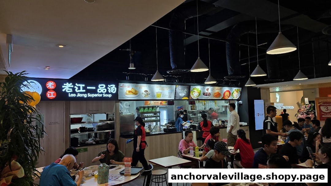Interior view of Lao Jiang Superior Soup, showing customers dining and staff at the counter.