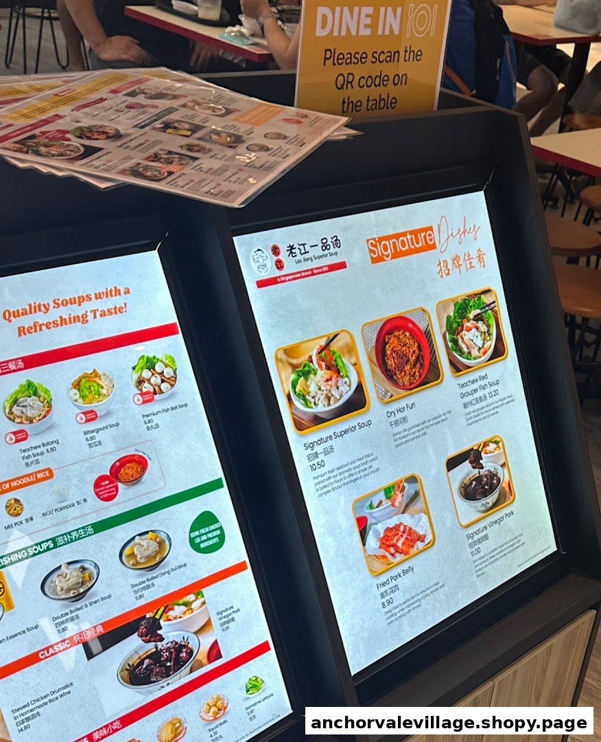 Illuminated menu boards displaying a variety of soups and signature dishes with prices.
