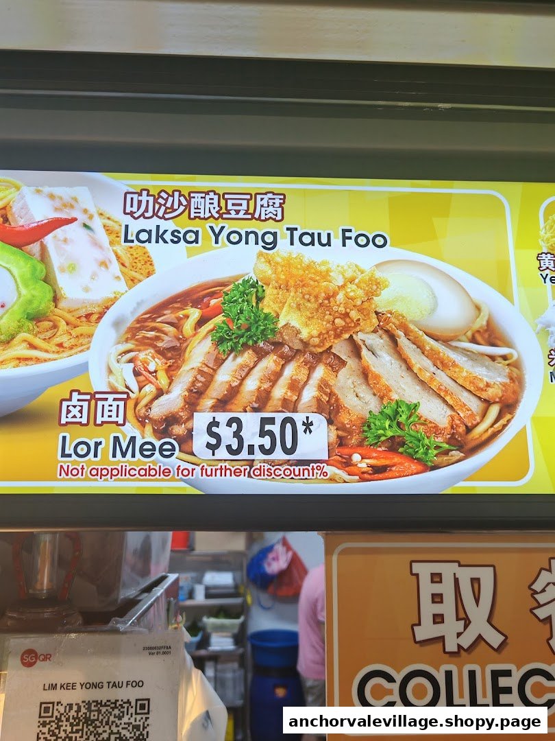 A vibrant menu board displaying Lor Mee and Laksa Yong Tau Foo with prices at Lim Kee Yong Tau Foo.