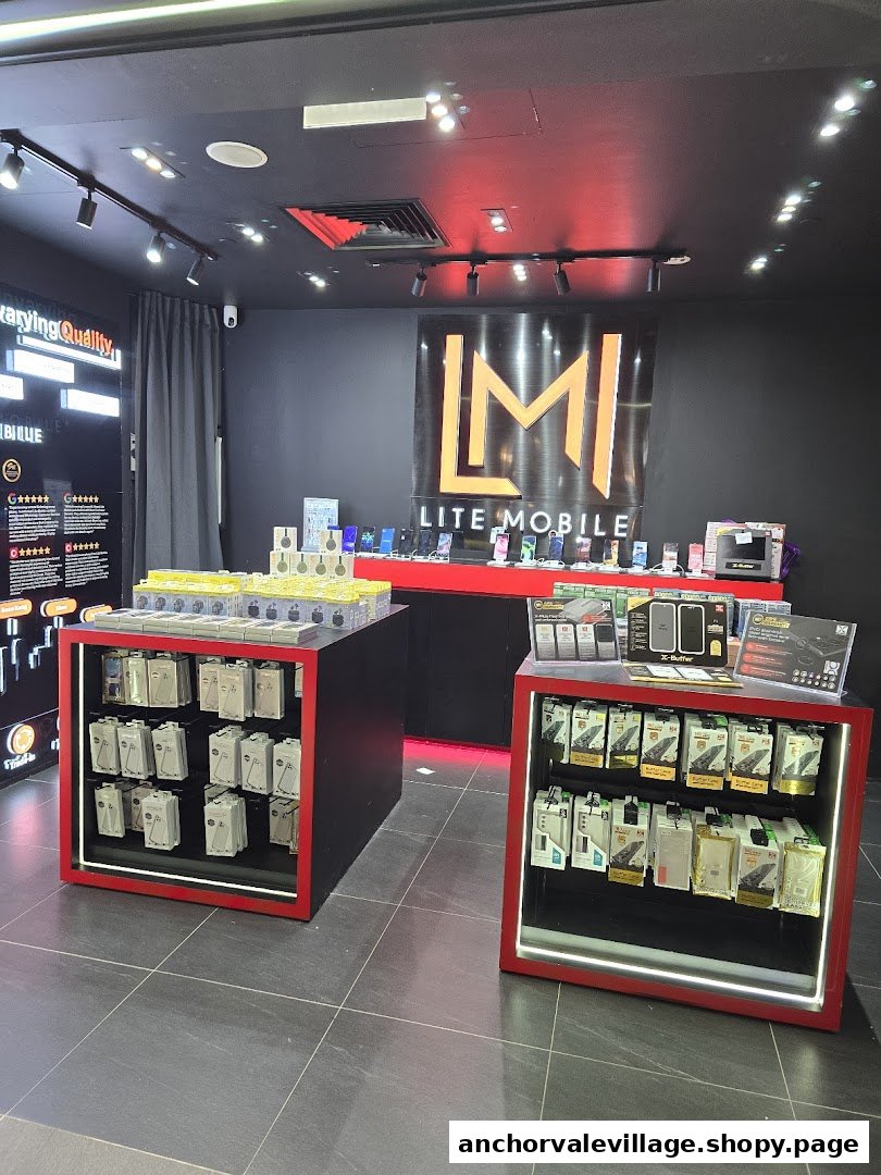 Interior view of Lite Mobile shop displaying mobile phones, accessories, and charging cables on counters.
