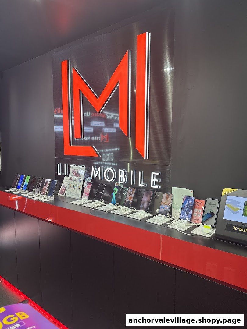 An interior view of Lite Mobile showcasing a wide array of smartphones on a sleek display counter.