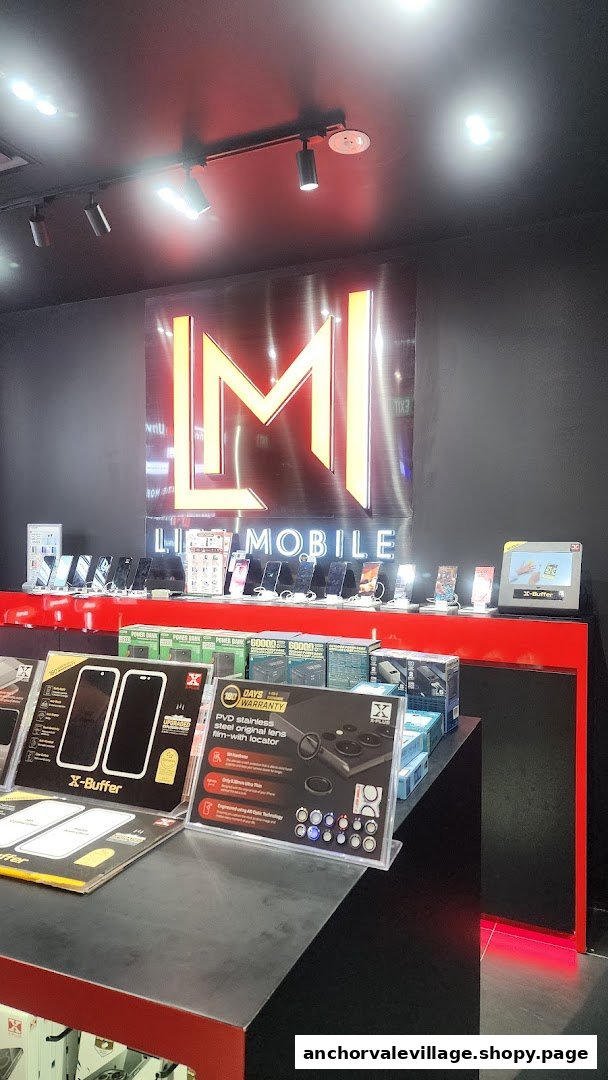 Interior view of Lite Mobile, showcasing mobile phones, accessories, and a prominent brand logo.