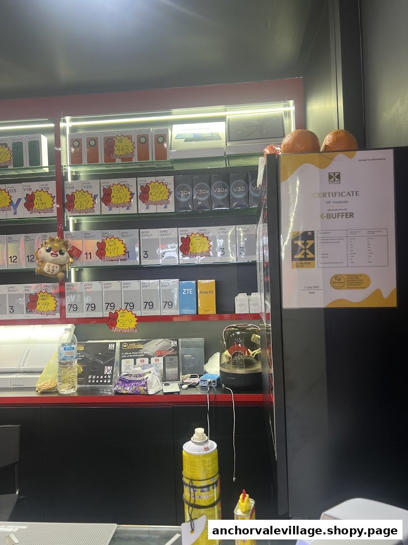 Interior view of Lite Mobile showcasing mobile phones, accessories, and promotional offers on display shelves.