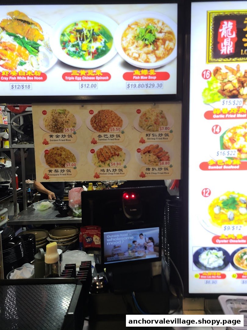 A digital menu board displaying various seafood and fried rice dishes with prices at Long Ding Seafood.