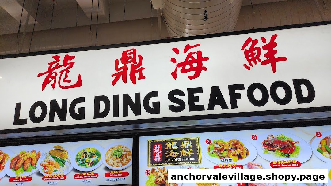 A display board for Long Ding Seafood, showcasing their name and various delicious seafood dishes.