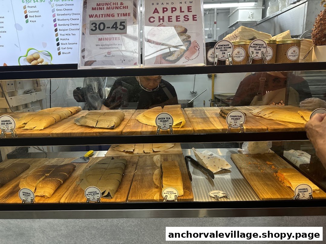 Display counter at Munchi Pancakes showcasing various flavored pancakes and homemade fillings.