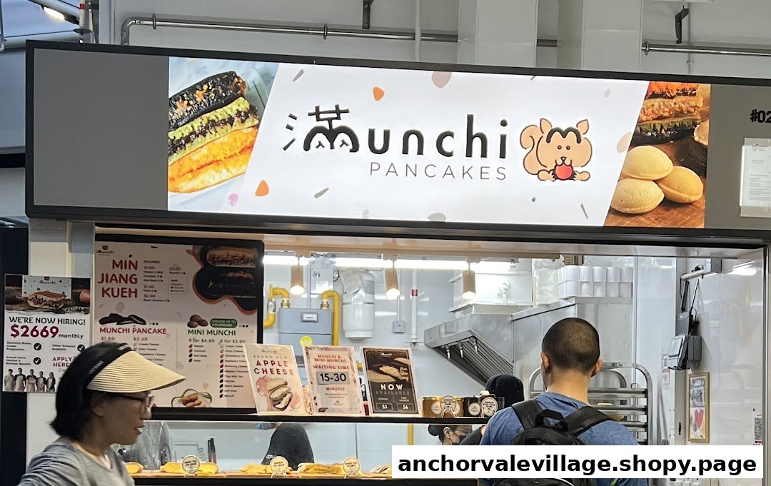 A bustling counter at Munchi Pancakes, showcasing their delicious pancakes and menu offerings.