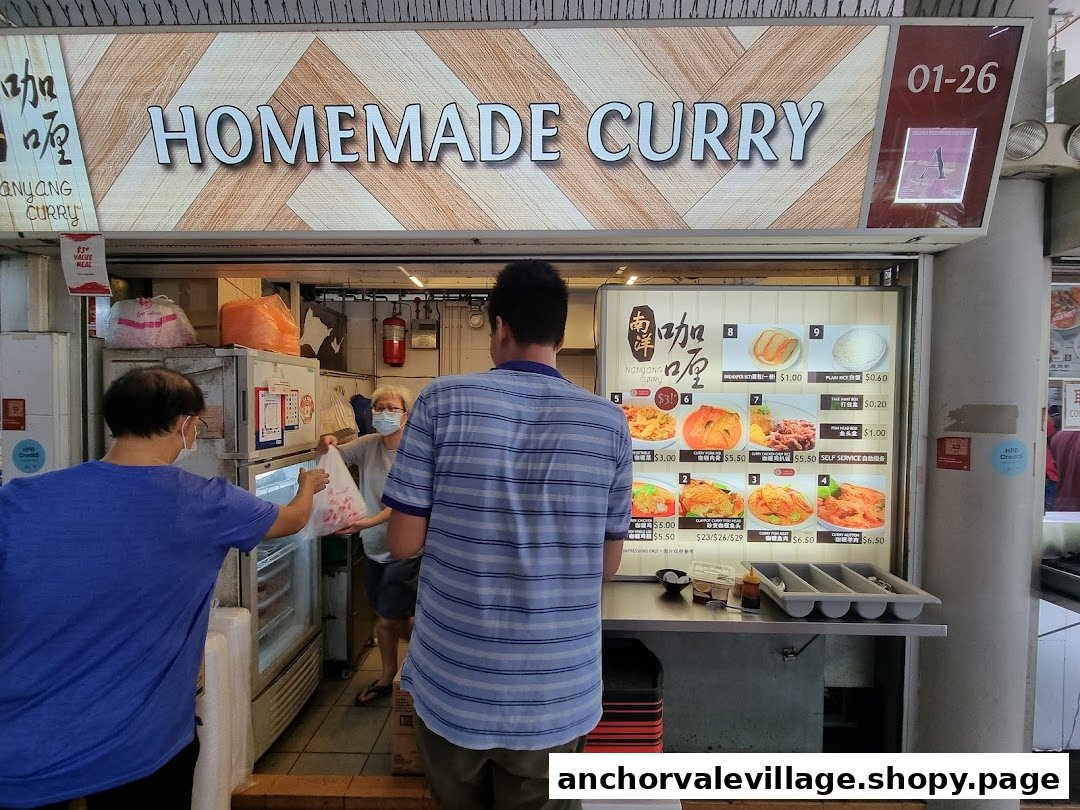 A detailed view of Nanyang Curry's menu board, showcasing various homemade curry dishes and prices.