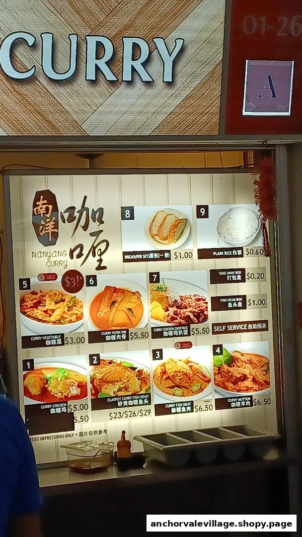 A brightly lit menu board for Nanyang Curry, showcasing various curry dishes and prices.