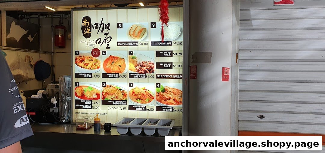 A brightly lit menu board for Nanyang Curry, showcasing various curry dishes and prices.