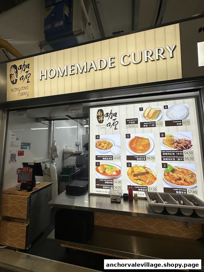 A detailed menu board at Nanyang Curry showcasing various homemade curry dishes and prices.