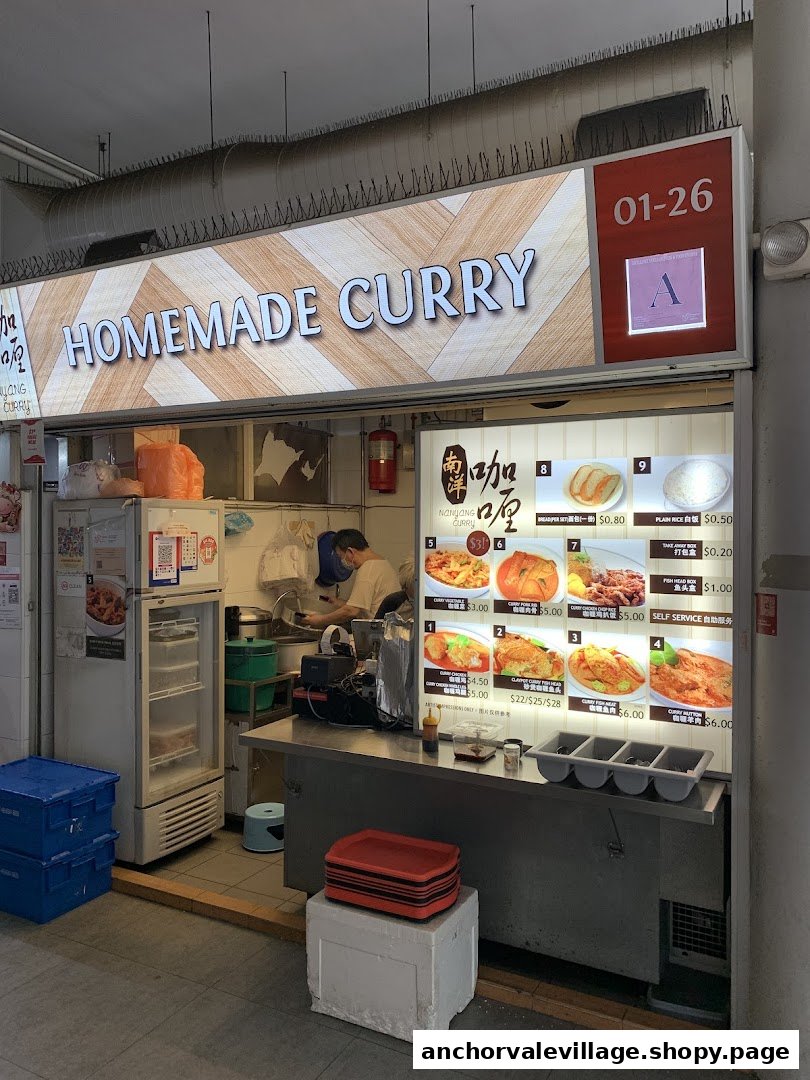 The front of Nanyang Curry, a food stall specializing in homemade curry, featuring its menu display.