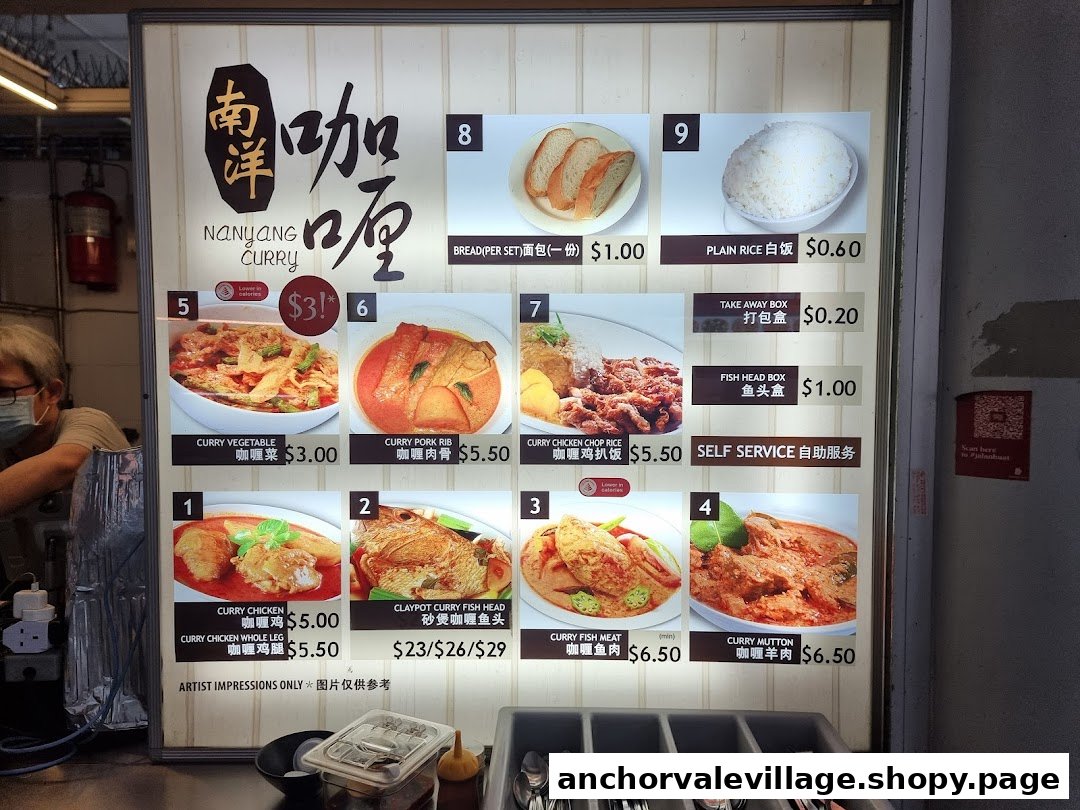 A brightly lit menu board displaying various curry dishes and prices from Nanyang Curry.