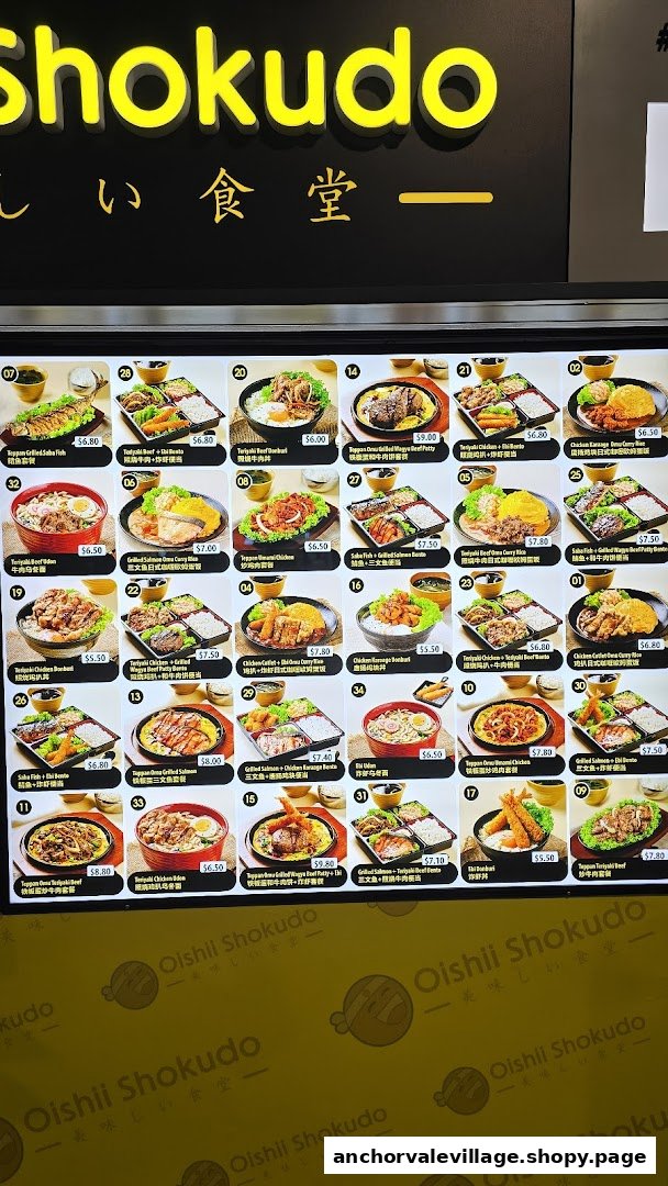 A vibrant menu board displaying a variety of Japanese rice bowls, bento sets, and grilled dishes with prices.