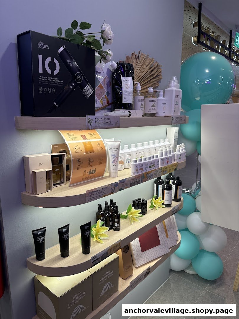 A well-lit display of hair care products, including a blow dryer and various beauty essentials, on wooden shelves.