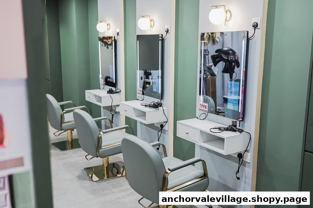 Interior view of a modern hair color lab with multiple styling stations, mirrors, and chairs.