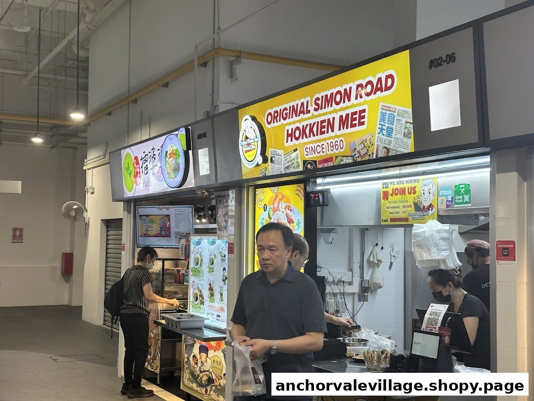 A bustling food stall, 'Original Simon Road Hokkien Mee', with customers and staff, showcasing its heritage.