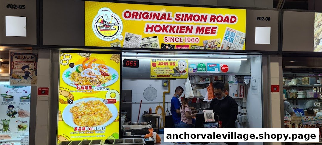Front view of Original Simon Road Hokkien Mee stall with menu displays and staff.