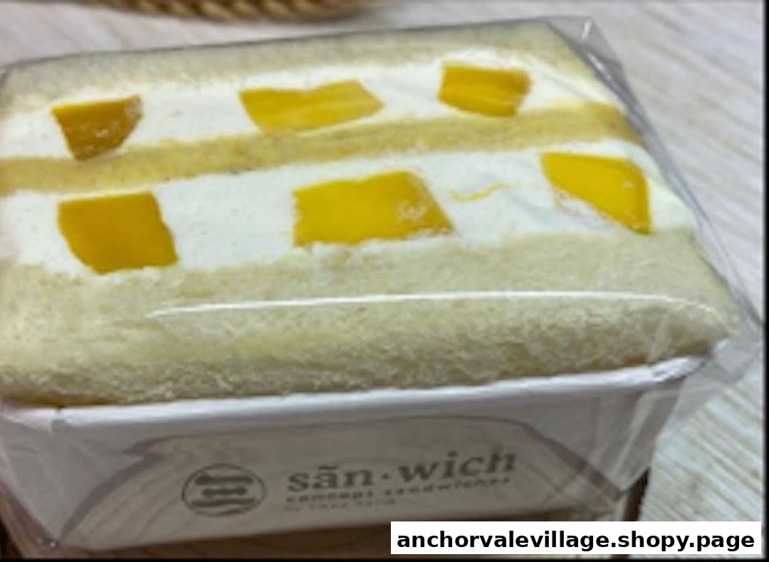 A delicious mango cream sandwich, beautifully layered and packaged for freshness.