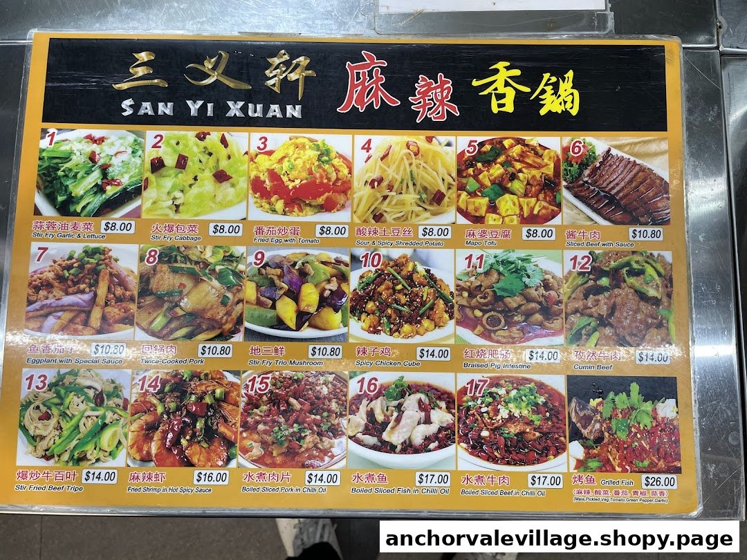 A comprehensive menu board displaying various Chinese dishes with images, names, and prices.