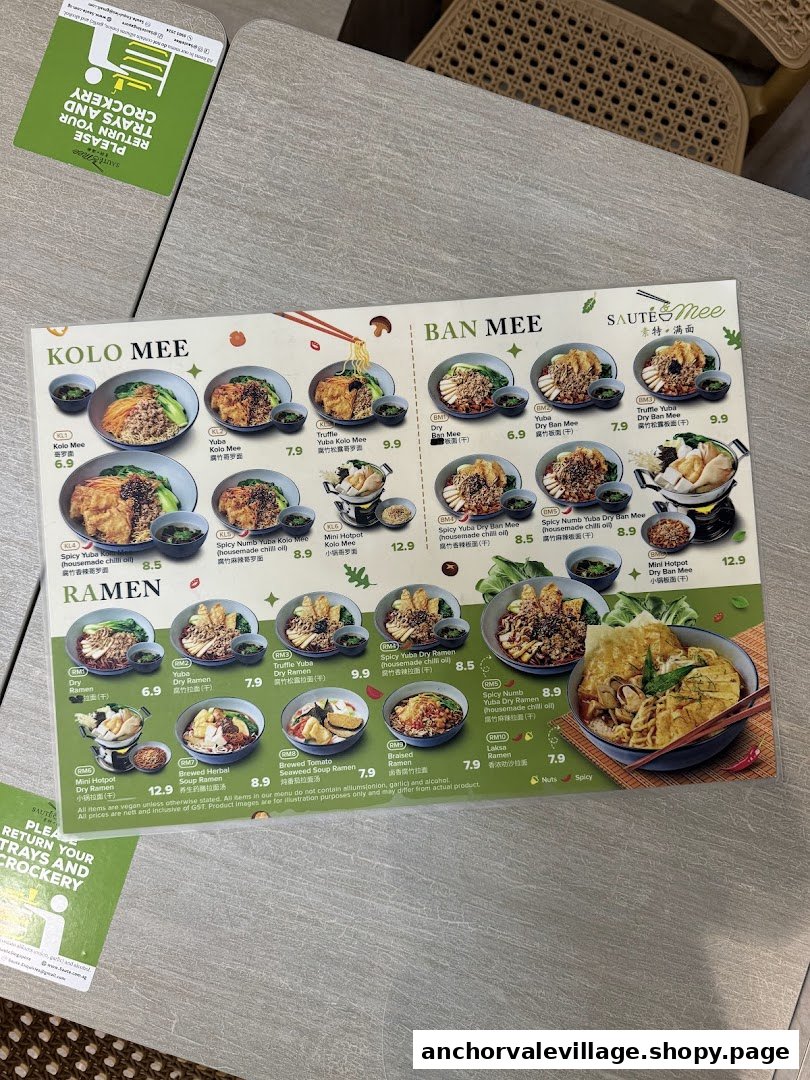A detailed menu displaying various vegan and vegetarian noodle dishes with prices.