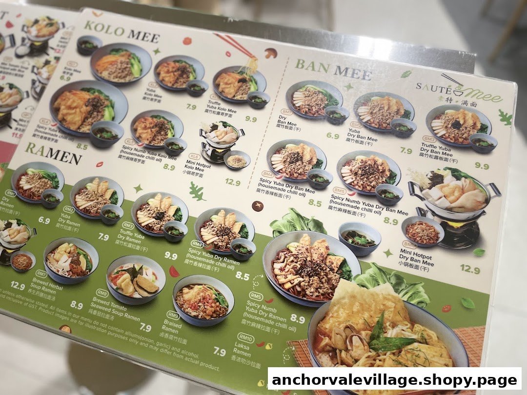 A close-up view of Saute Mee's menu, showcasing various vegan and vegetarian noodle dishes.