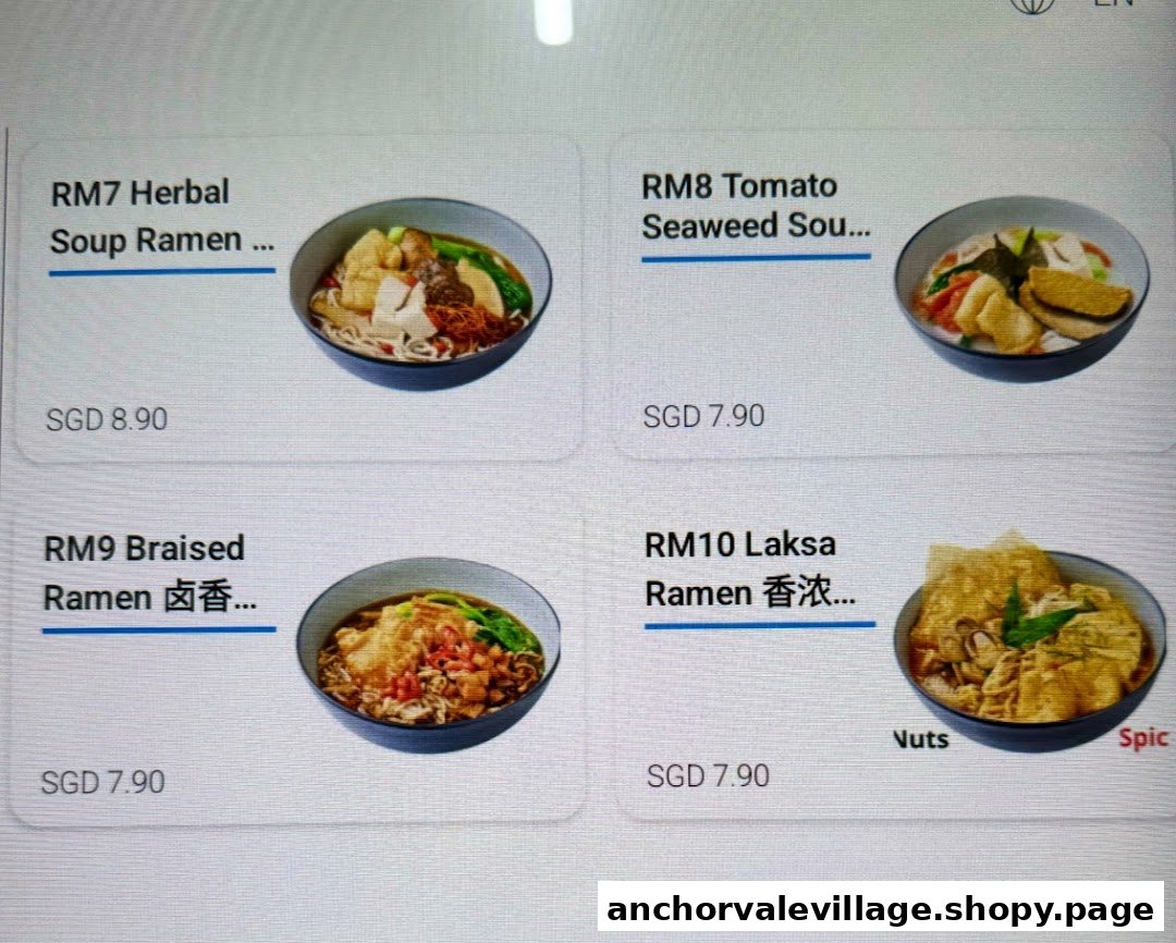 A digital menu display showcasing four different vegetarian ramen dishes with prices and images.