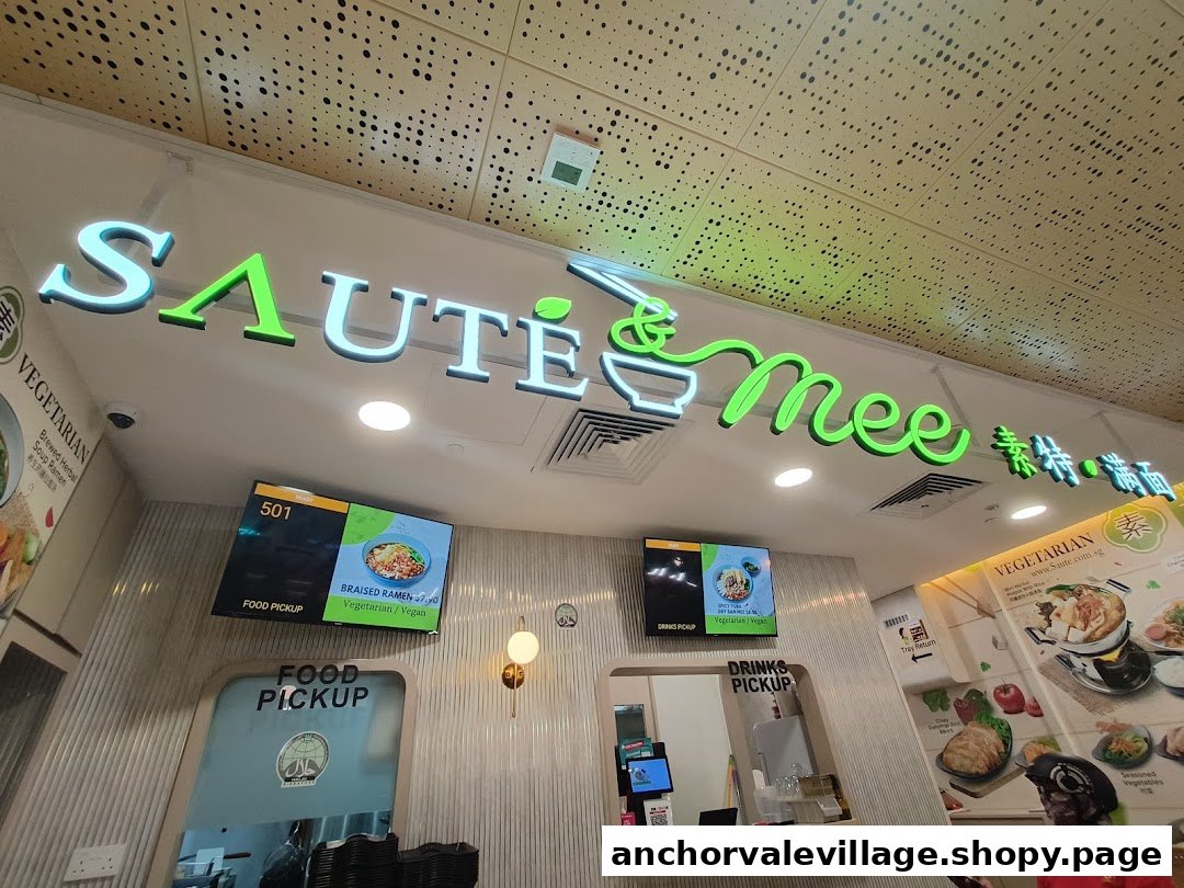 Interior view of Saute Mee's counter with digital menu displays and pickup points.