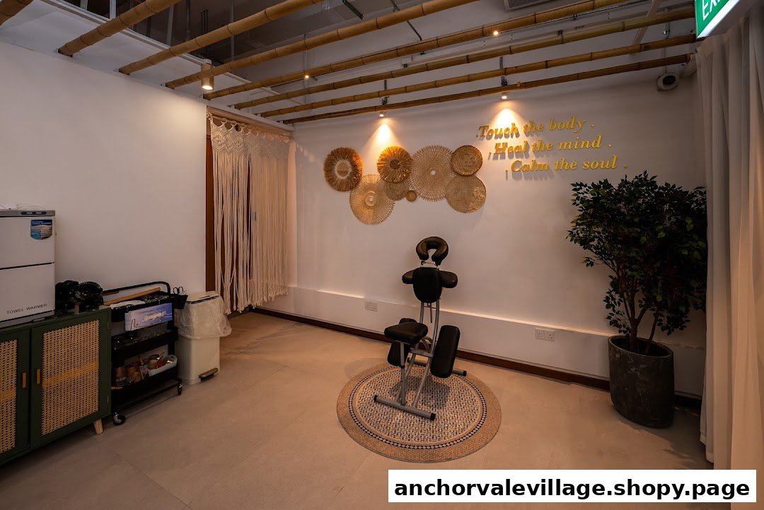 An inviting interior of a wellness shop with a massage chair and calming decor.