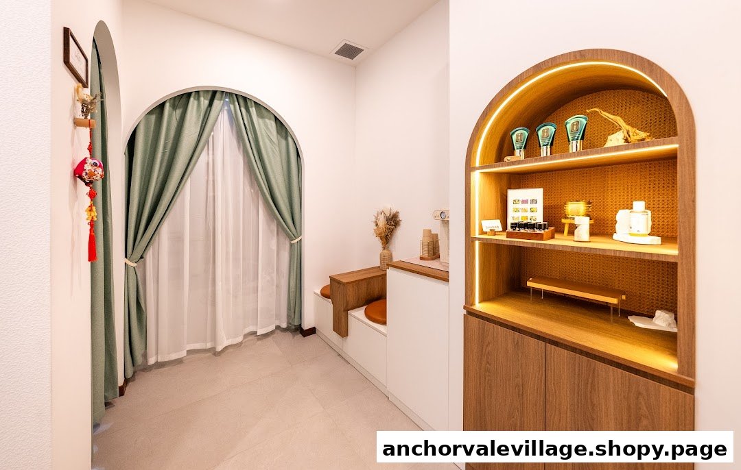 A bright and modern interior of Shugar Foot Body Wellness with a cozy waiting area and product display.