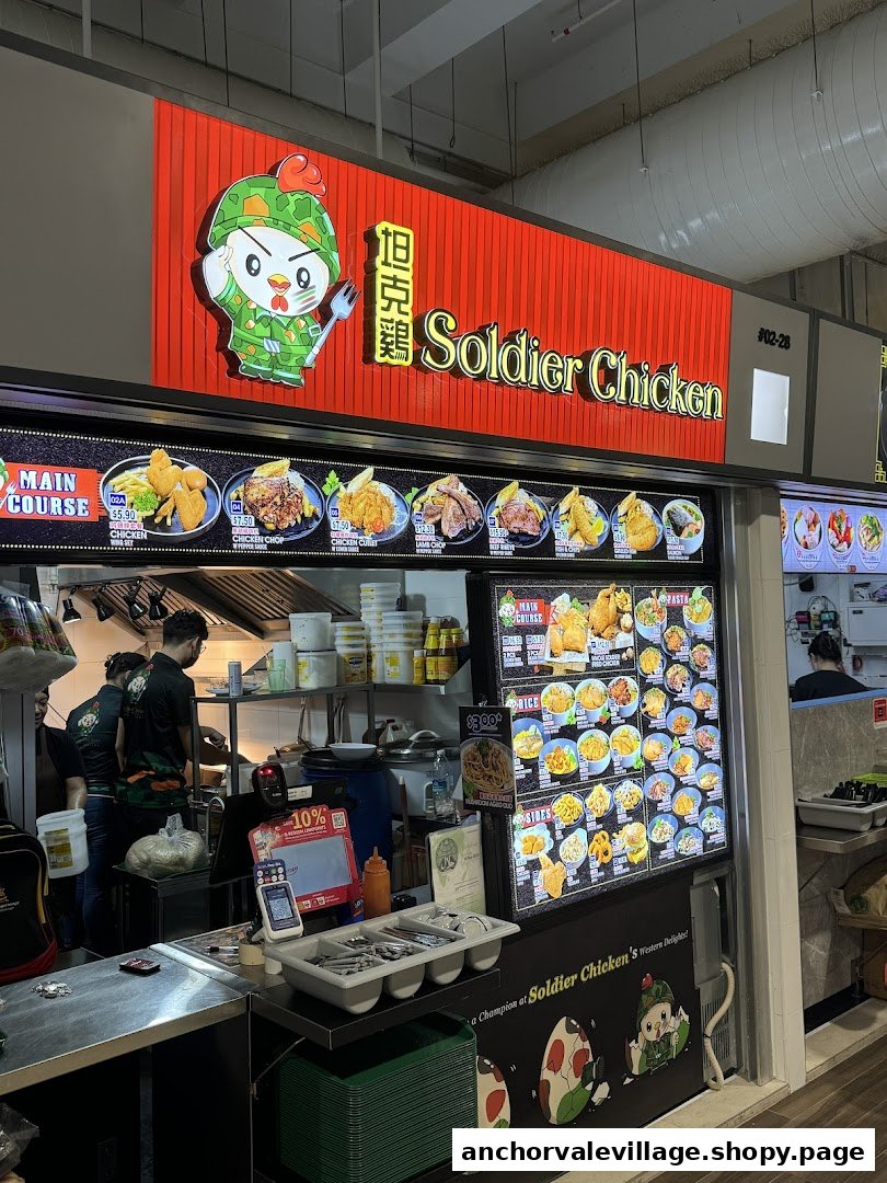 A vibrant shot of Soldier Chicken's counter, showcasing their menu display and kitchen operations.