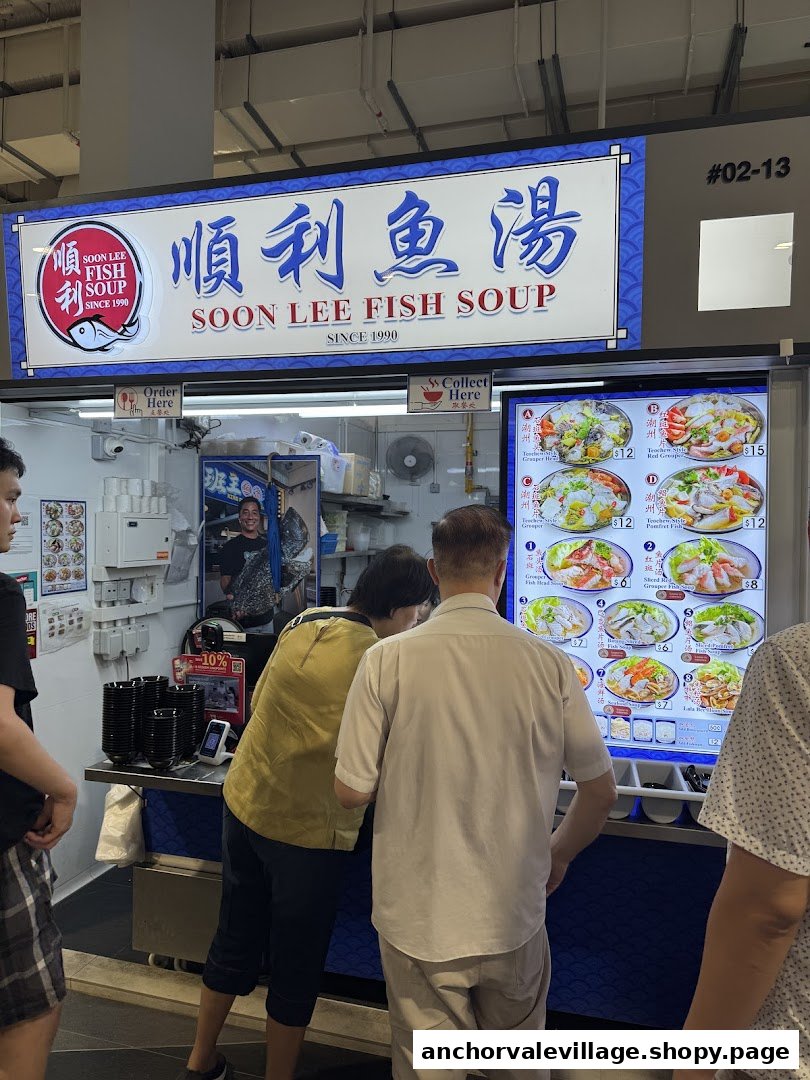A digital menu display at Soon Lee Fish Soup, showing various fish soup options and prices.