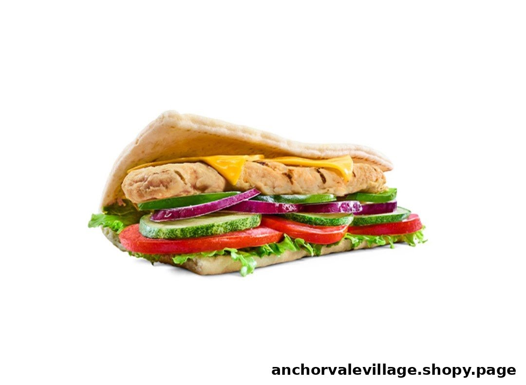 A delicious Subway sandwich featuring chicken, cheese, and fresh vegetables on flatbread.