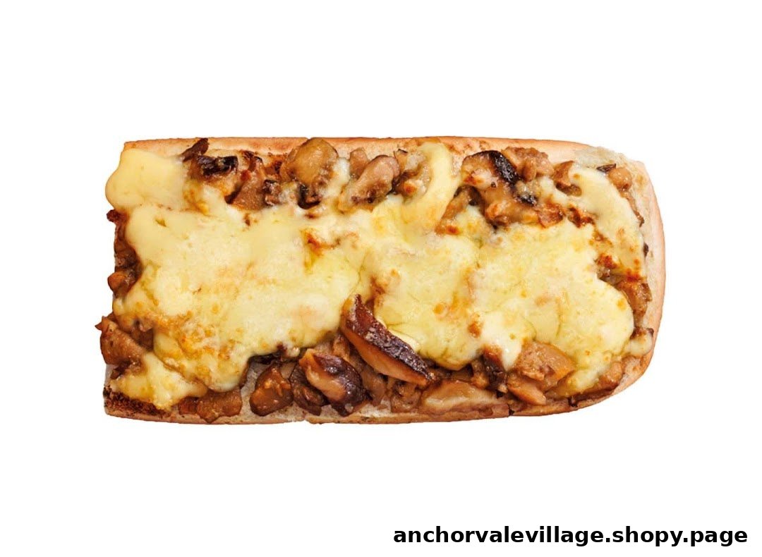 A close-up of a toasted Subway sandwich with melted cheese and a savory filling.