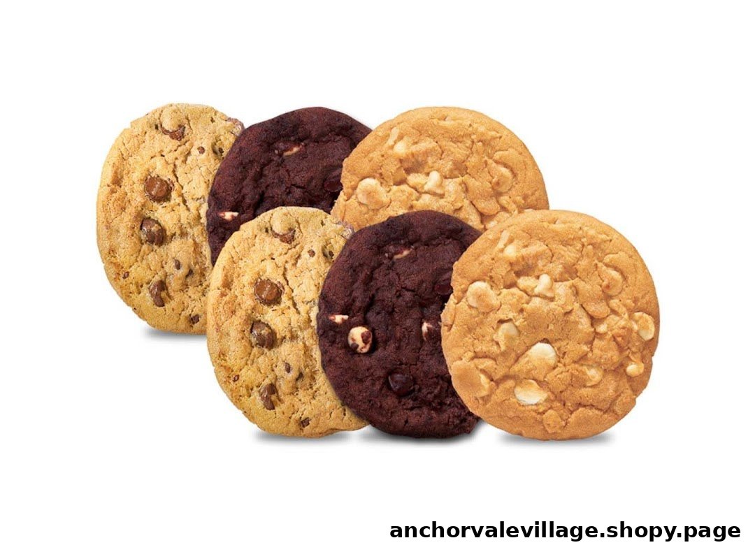 A delicious assortment of freshly baked Subway cookies, including chocolate chip, double chocolate, and white chip.