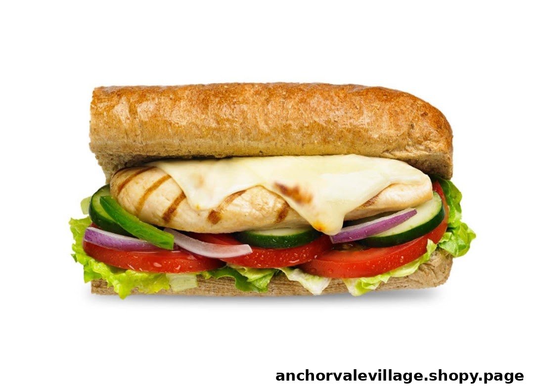 A delicious Subway sandwich featuring grilled chicken, melted cheese, and fresh vegetables on whole wheat bread.