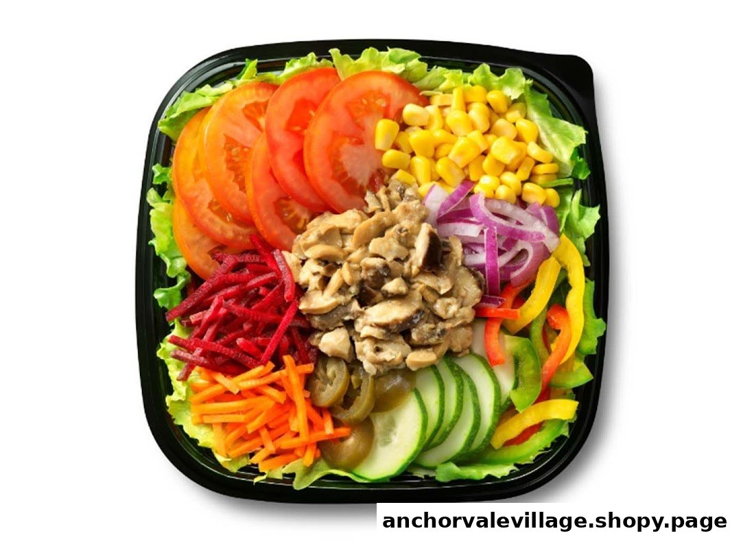 A colorful Subway salad with fresh vegetables, mushrooms, and various toppings in a black bowl.