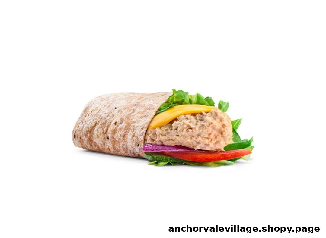 A delicious Subway wrap filled with tuna, cheese, fresh lettuce, red onion, and tomato.