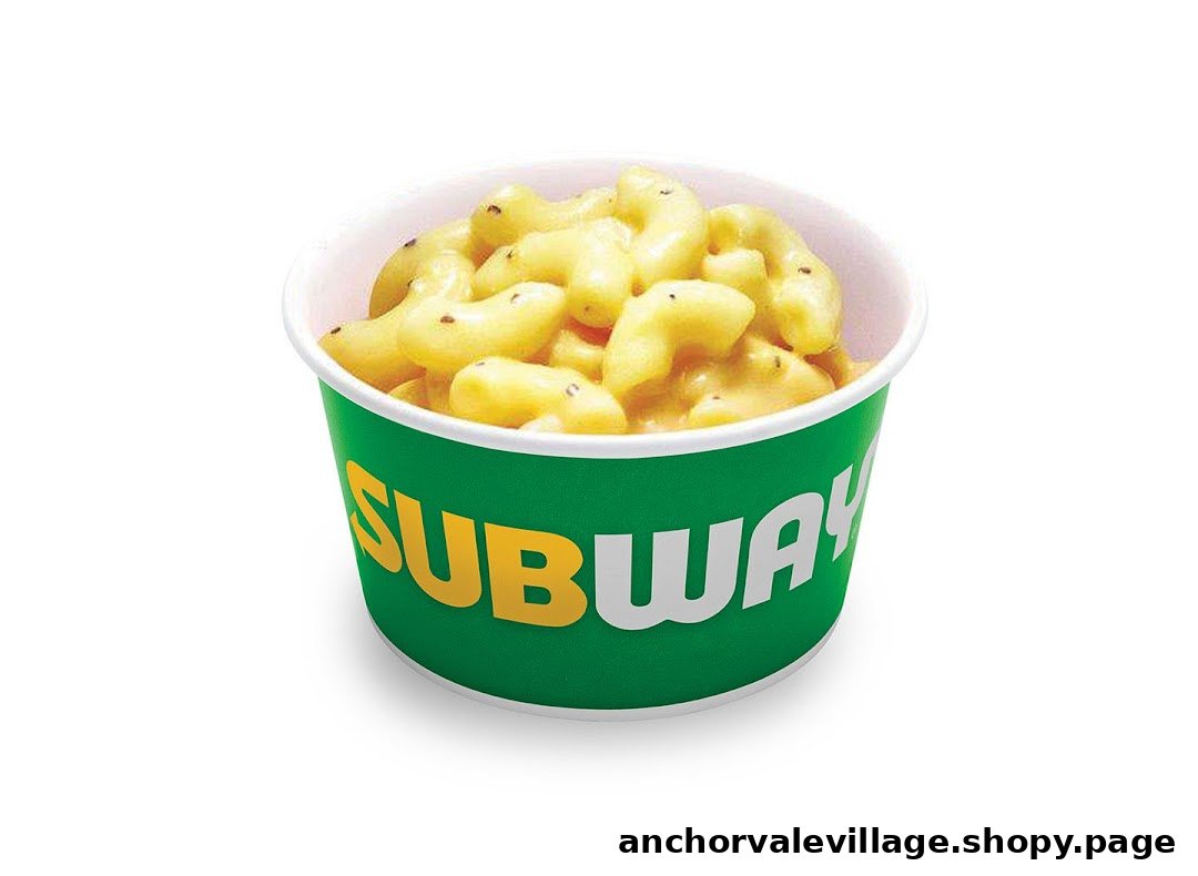 A cup of Subway's macaroni and cheese, featuring the brand's green and yellow logo.