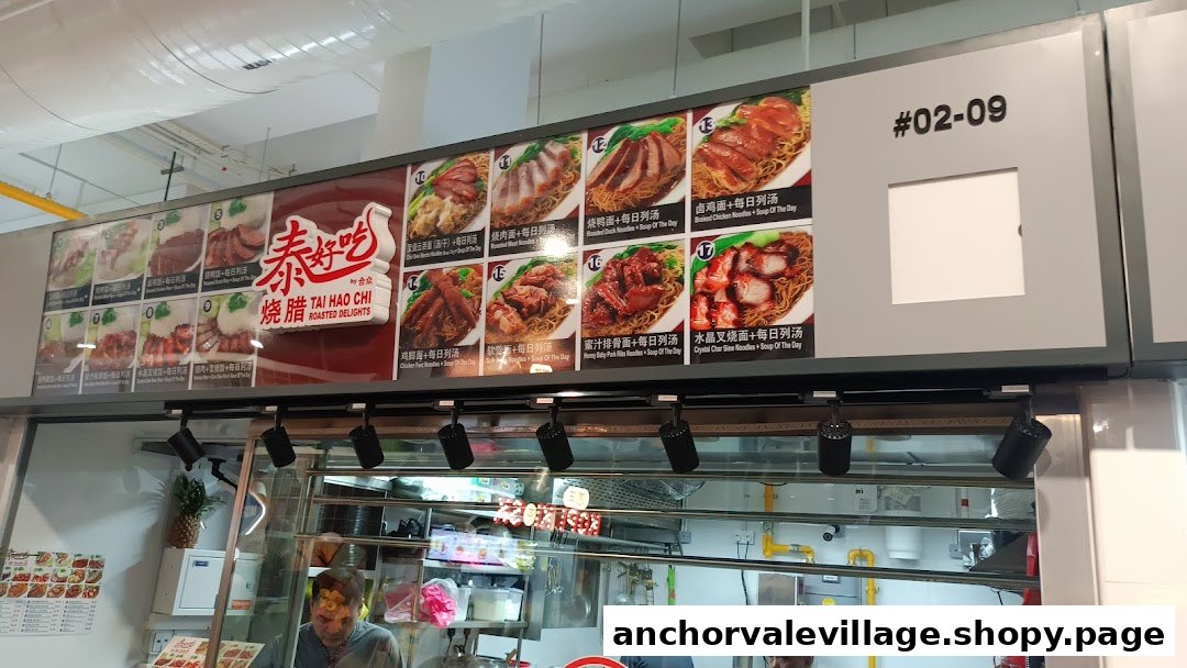 A vibrant menu board showcasing various roasted meat and noodle dishes at Tai Hao Chi Roasted Delights.