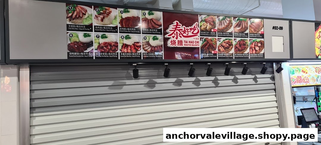 A menu board for Tai Hao Chi Roasted Delights, showcasing various roasted meat rice and noodle dishes.