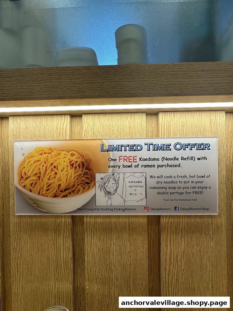 A promotional sign advertising a limited-time offer for a free noodle refill with ramen purchase.