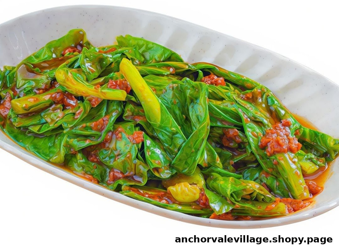 A vibrant dish of stir-fried green vegetables with a rich, savory sauce in a white serving dish.