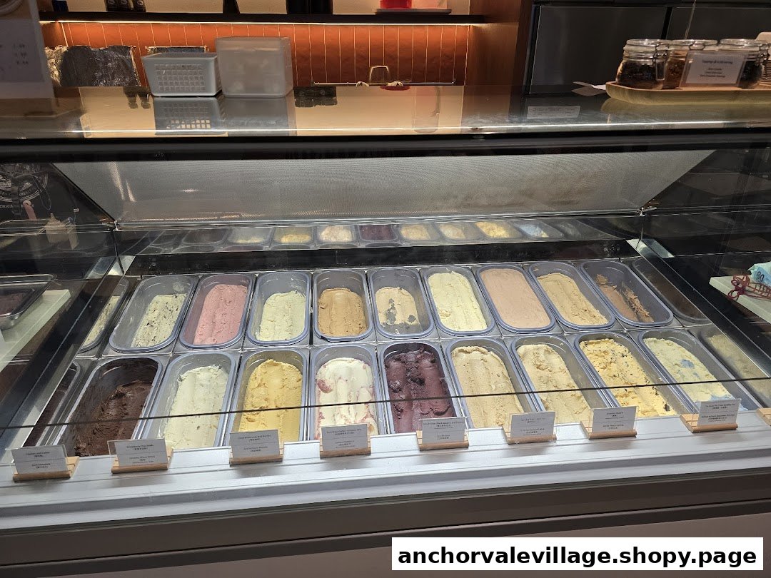 A vibrant display case showcasing a wide variety of delicious ice cream and gelato flavors.
