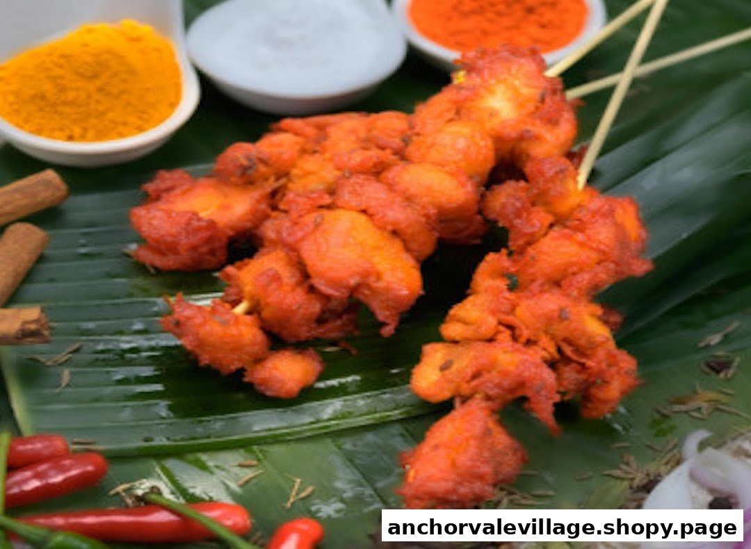 Close-up of vibrant orange fried vadai or fritters on skewers, garnished with spices on a banana leaf.