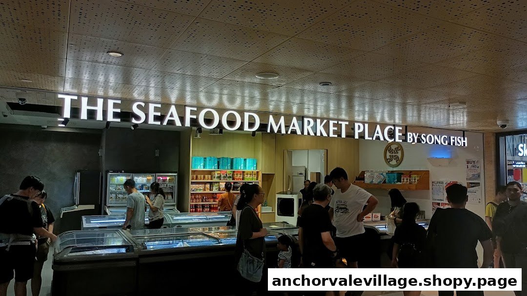 Customers browse fresh seafood in freezers at The Seafood Market Place By Song Fish.