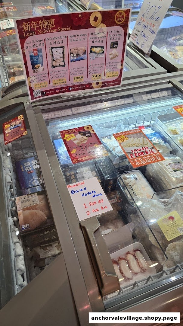 A freezer display showcasing various frozen seafood products and promotional offers.