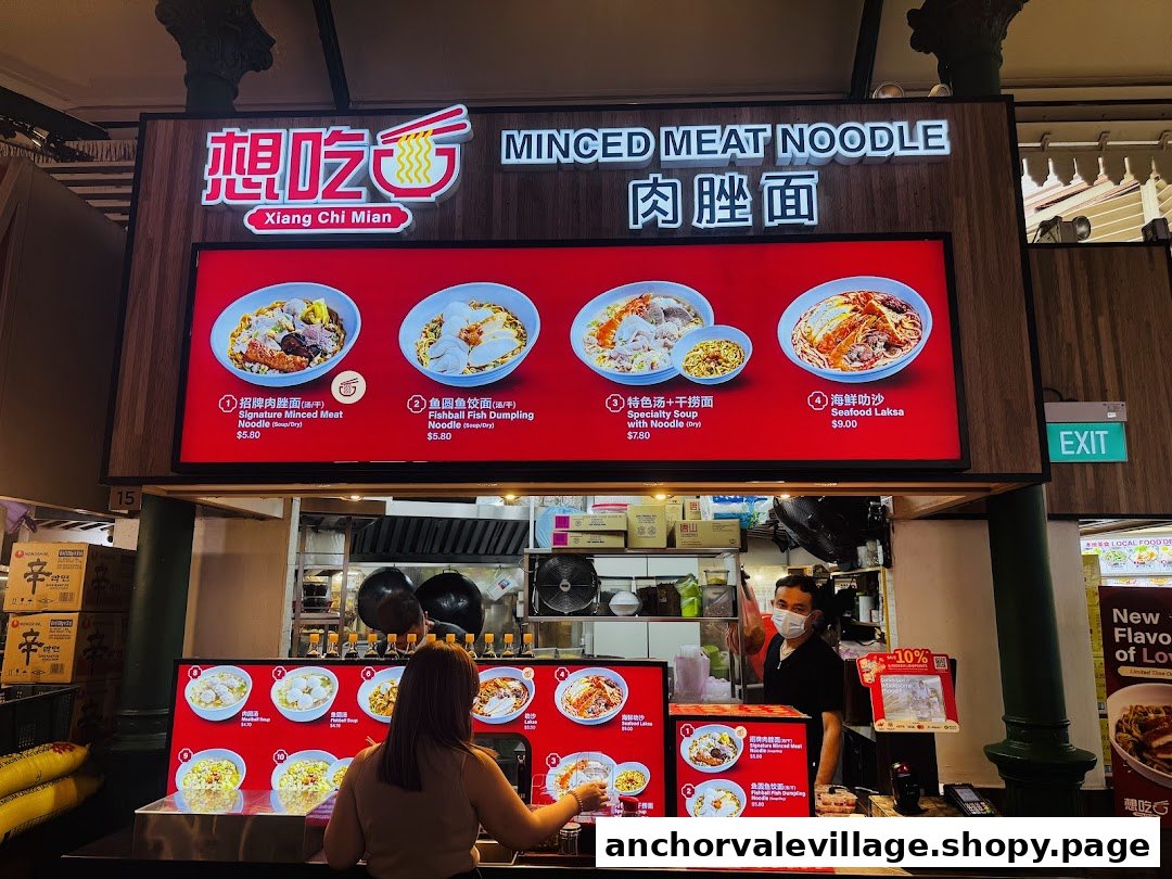 A food stall named Xiang Chi Mian displaying its minced meat noodle menu.